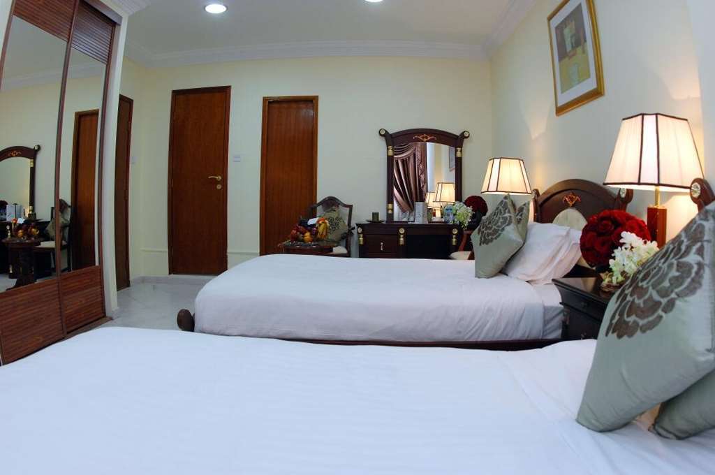 Al Muntazah Plaza Hotel Doha Rum bild